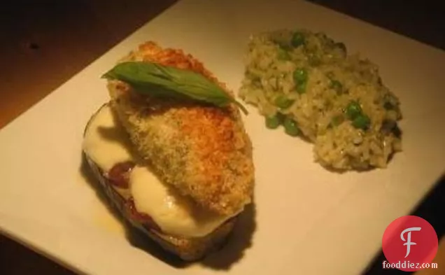 Parmesan Crusted Chicken on Eggplant Sun Dried Tomato and Mozzar