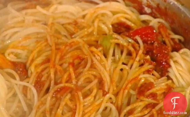 Spaghetti with a Hole and Artichokes: Bucatini al Ragu con Carciofi