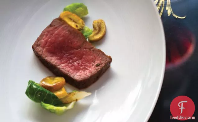 Rib Eye Roast with Chestnuts and Brussels Sprout Leaves