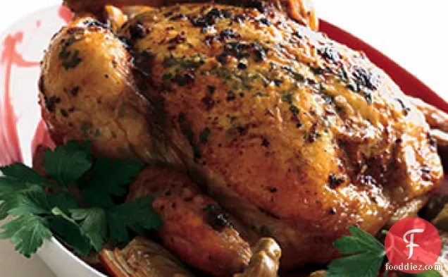 चिकन को आर्टिचोक और ग्रेमोलटा बटर के साथ भूनें