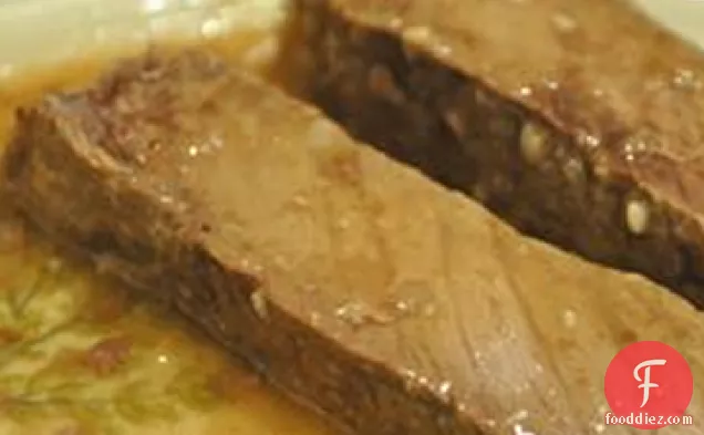 Braised Flank Steak with Lemon and Garlic