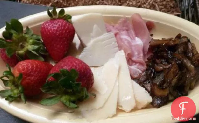 Antipasto of Prosciutto, Cheese, Strawberries and Balsamic Onion