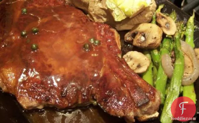 New York Steaks in Green Peppercorn Sauce