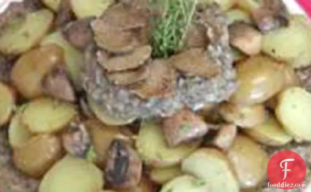 Potatoes With a Mushroom Puree & Garnished With Truffles