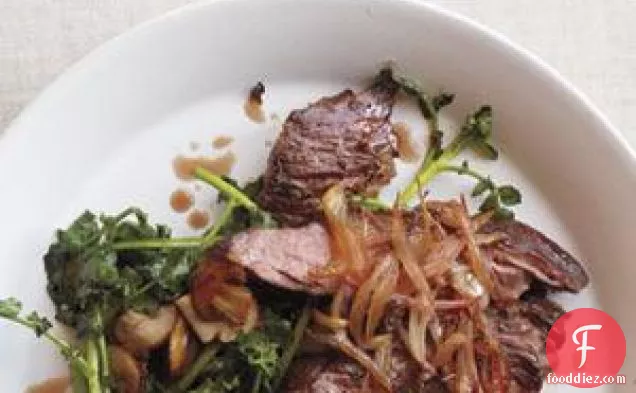 स्कर्ट स्टेक के साथ प्याज़ और सॉटेड वॉटरक्रेस रेसिपी