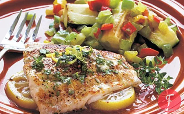 नींबू लाल स्नैपर जड़ी बूटी मक्खन के साथ