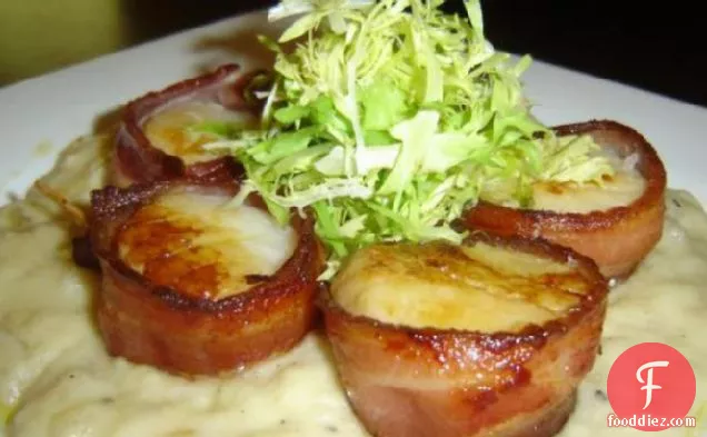 Bacon Wrapped Sea Scallops Served on Creamy Brie Sauce