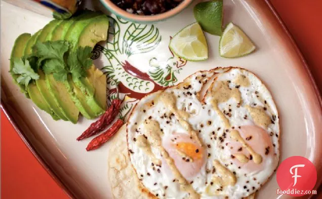 Fried Egg Taco With Avocado And Chipotle Black Beans