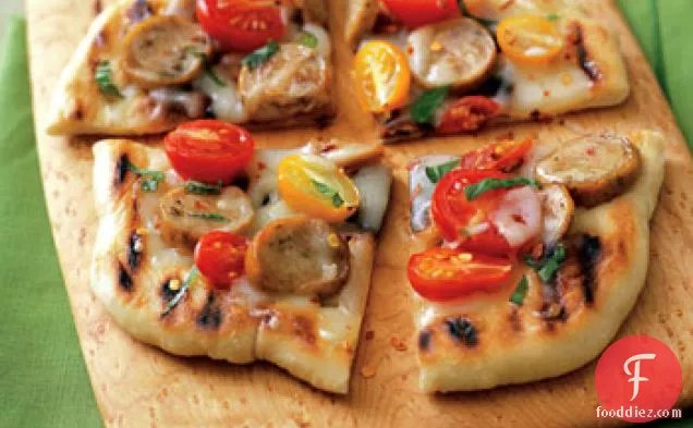 Pizza with Sausage, Tomatoes and Basil
