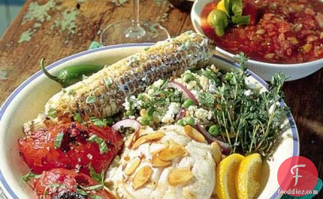 नारंगी-बादाम सॉस के साथ ग्रील्ड स्नैपर