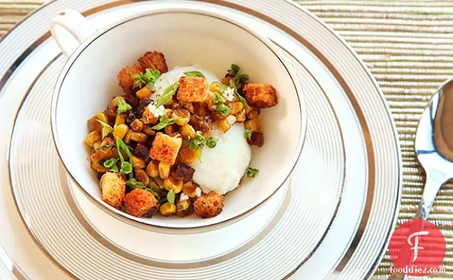 Poached Eggs With Corn, Chorizo, Basil, and Brioche Croutons