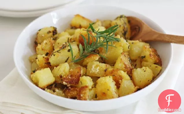 Polenta Crusted Roasted Potatoes with Herbs and Garlic