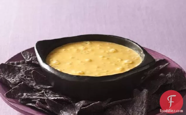 Bubbling Cauldron Cheese Dip with Bat Wing Dippers