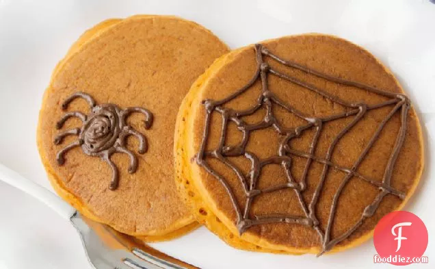 Pumpkin Pancakes with Halloween Spiderwebs