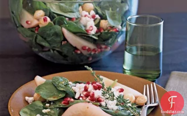 Poached Pear, Macadamia, and Spinach Salad with Goat Cheese