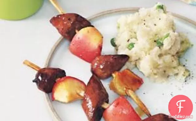 Sausage And Apple Kebabs With Smashed Potatoes And Peas