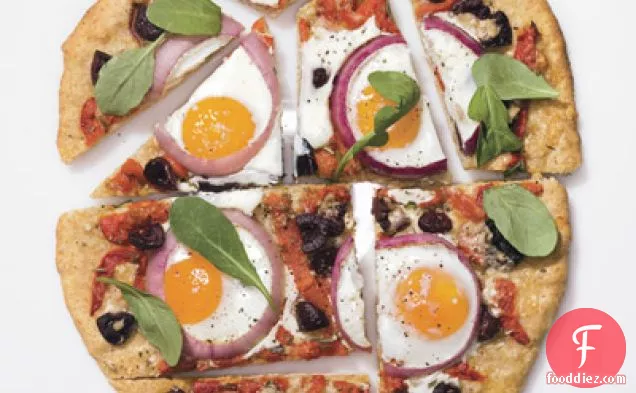 Pizza with Eggs, Roasted Red Peppers, Olives and Arugula