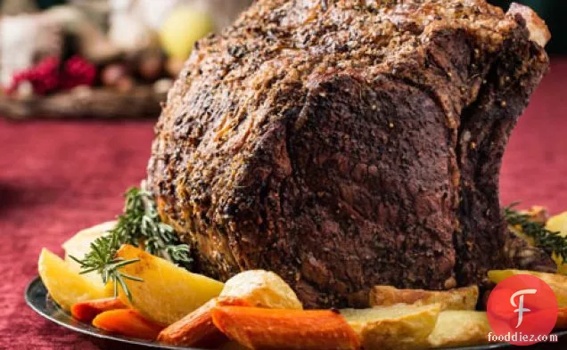 Herb-Crusted Beef Rib Roast with Potatoes, Carrots, and Pinot Noir Jus