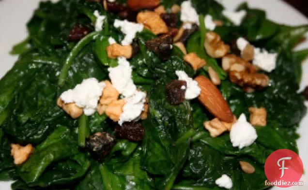 Spinach With Dried Fruit, Nuts And Goat Cheese