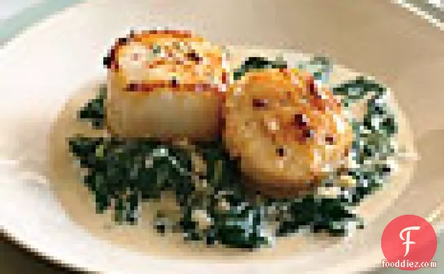 Seared Scallops on Spinach with Apple-Brandy Cream Sauce