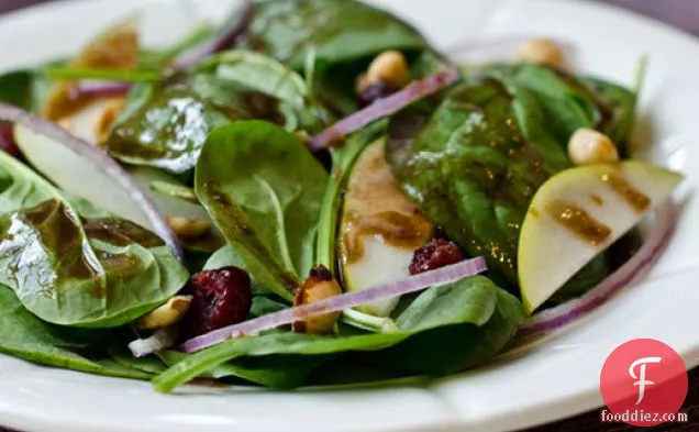 Baby Spinach Salad with Pears, Red Onions, Cranberries and Toasted Hazelnuts