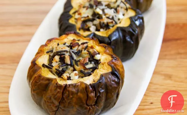 Baked Acorn Squash with Wild Rice, Pecan and Cranberry Stuffing