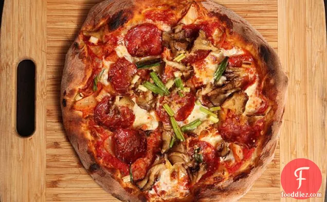 New York Style Pizza with Kimchi, Soppressata, and Maitake Mushrooms