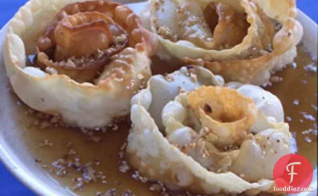 Fried Pastry Spirals with Honey, Sesame, and Walnuts