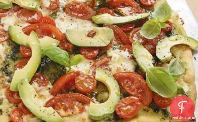 Tricolore pizza with basil oil