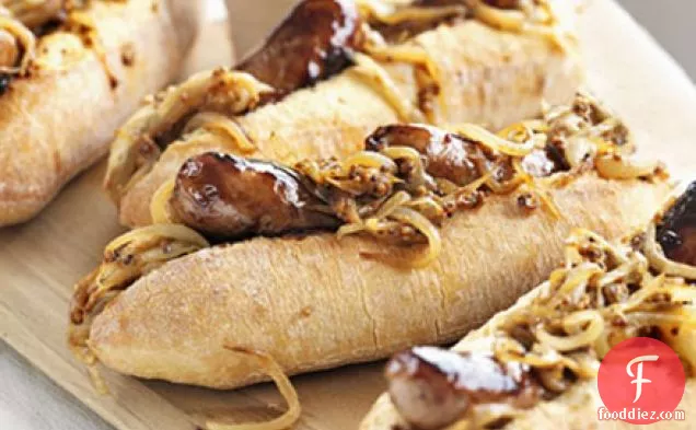 Maple-glazed hot dogs with mustardy onions
