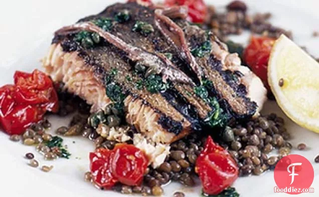 Grilled wild salmon with anchovies, capers & lentils