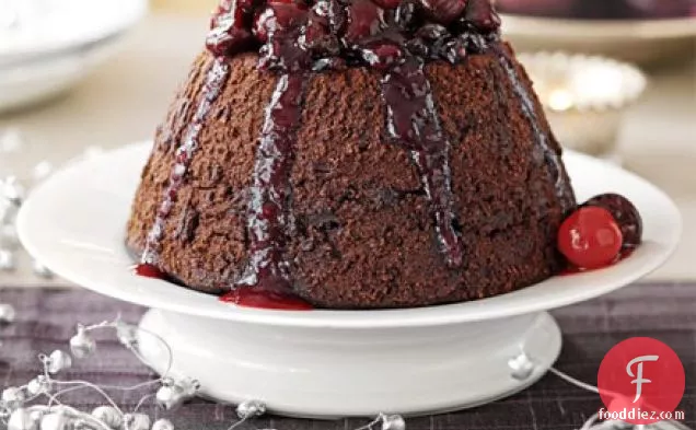 Chocolate pudding with spiced berry syrup