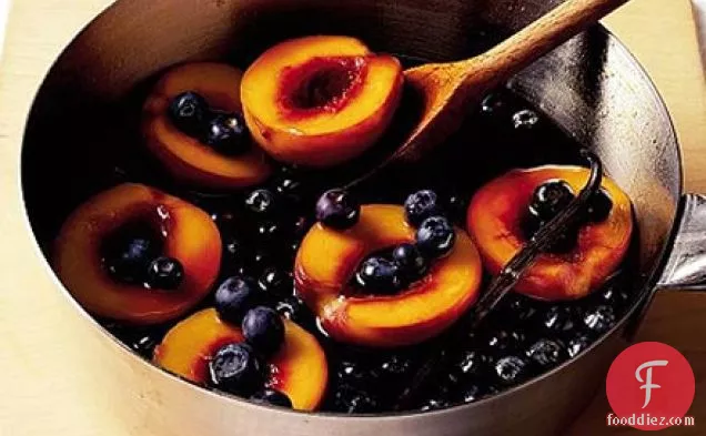 Caramel poached peaches with blueberries