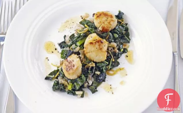 Seared scallops with flavoured greens