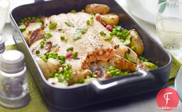 Roast salmon with peas, potatoes & bacon