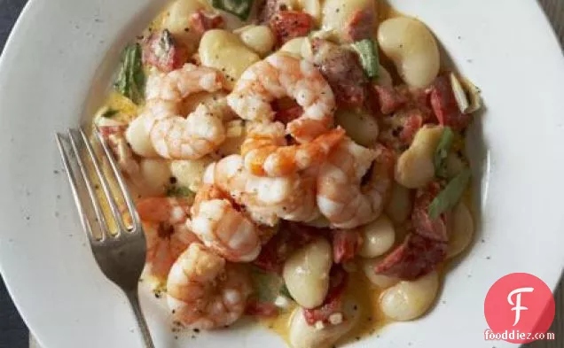 Creamy butter beans with quick fried prawns