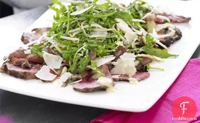 Rare beef & anchovy salad with rocket & Caesar dressing