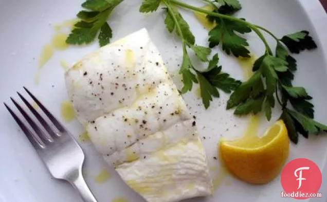 Poached Halibut With Sweet Garlic, Parsley, And Lemon