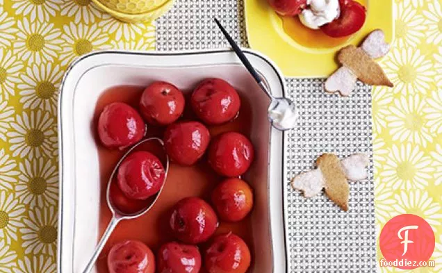 Honey-orange poached plums