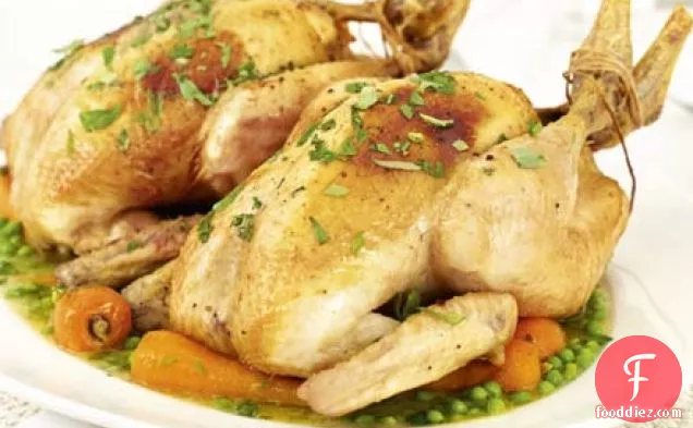 Mustard-buttered chicken with tarragon, peas & carrots