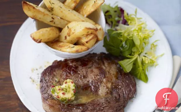 Rib-eye steaks with chilli butter & homemade chips