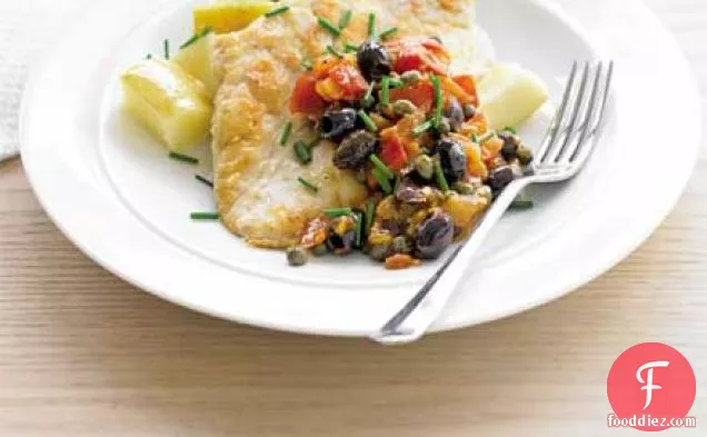 Flattened chicken with tomatoes, olives & capers