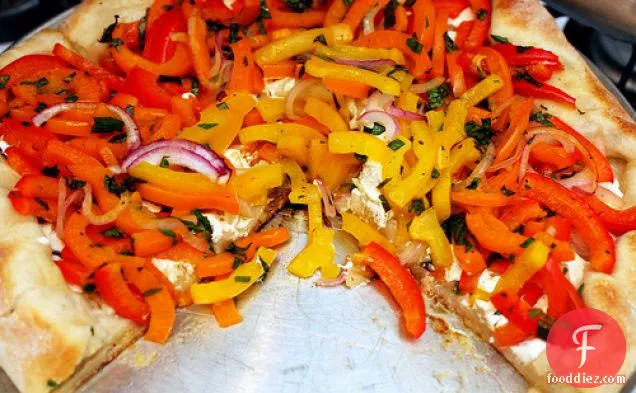 Pizza With Red And Yellow Peppers