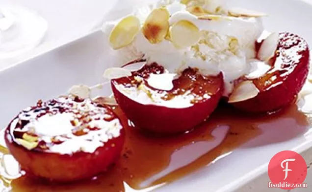Peppered plums with almond ice