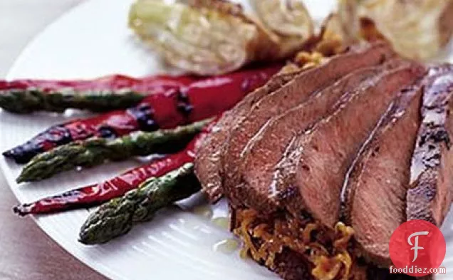Marinated barbecue lamb with shallot marmalade, served with griddled vegetables