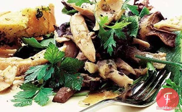 Warm chicken salad with garlic mushrooms