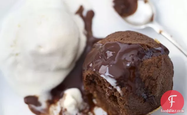 Chocolate & almond puds with boozy hot chocolate sauce