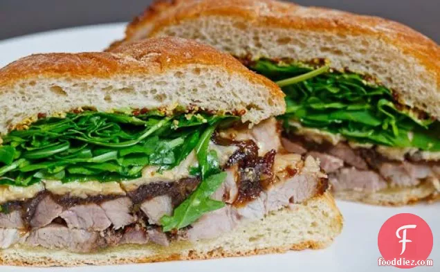 Porchetta Sandwich with Balsamic Caramelized Onions, Asiago Cheese and Arugula