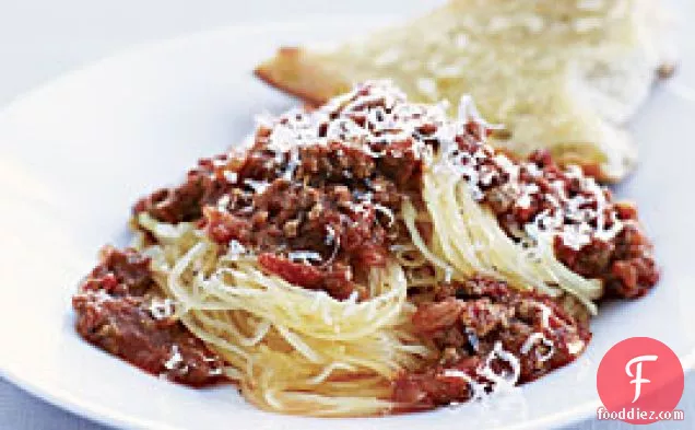 Beef Ragù Over Spaghetti Squash With Garlic Bread