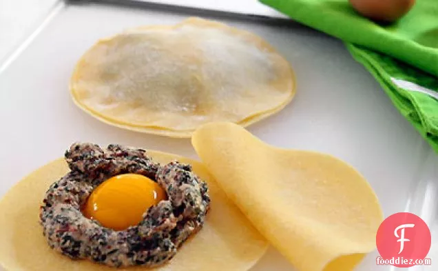 Raviolo with Egg Yolk in Truffle Scented Sage Brown Butter Sauce